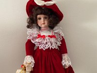 Doll $25.00.   Will arrange delivery.  Please write to store@norwoodparkhistoricalsociety.org.